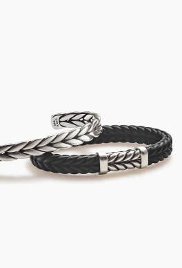Two David Yurman sterling silver chevron bracelets.